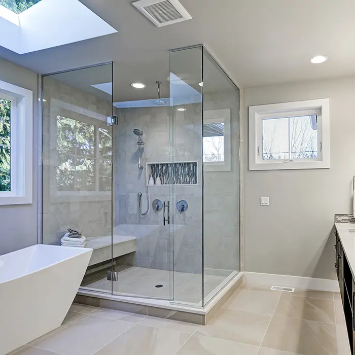 Large walk-in shower with glass enclosure