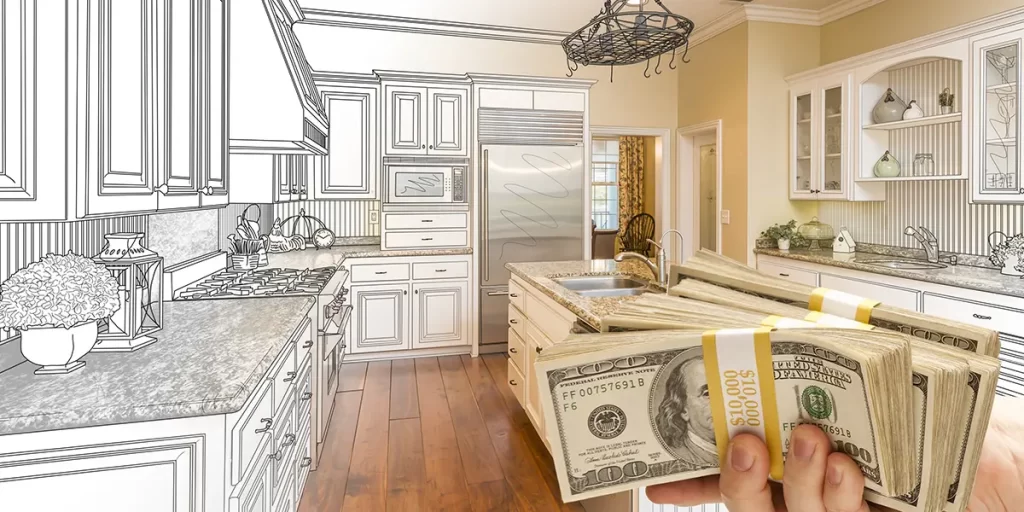 Stack of money in front of a kitchen renovation plan