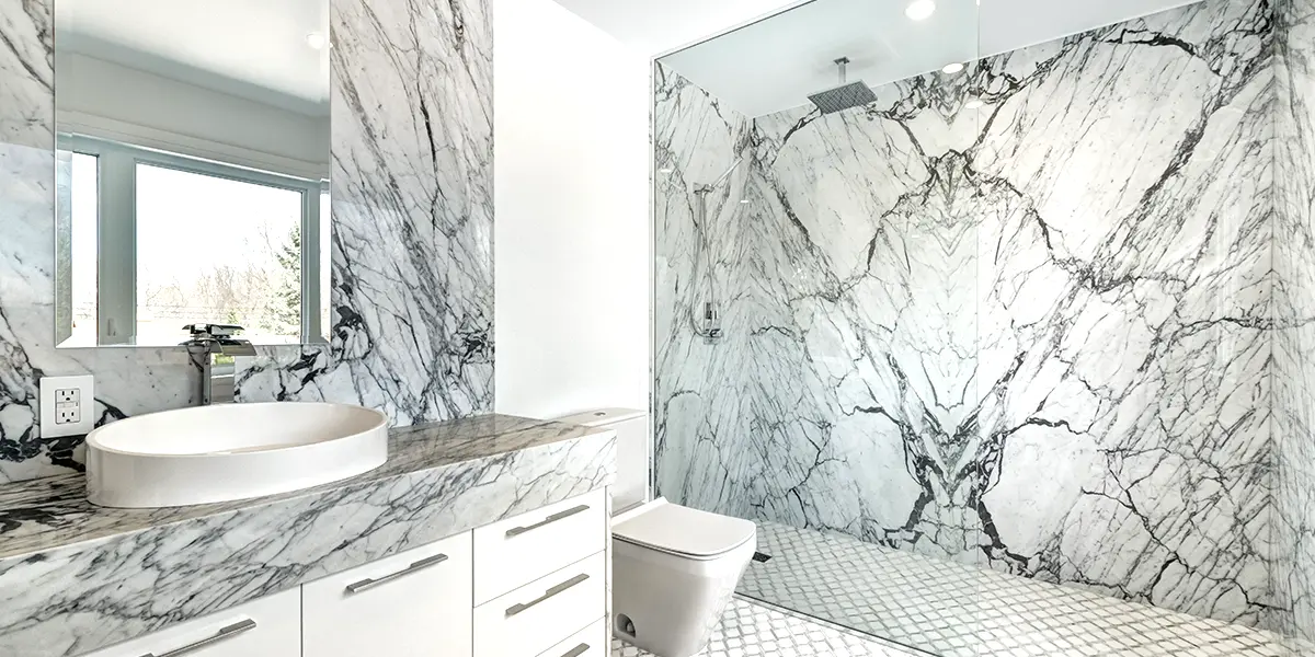 Big bathroom with large-scale marble tile and walk-in shower