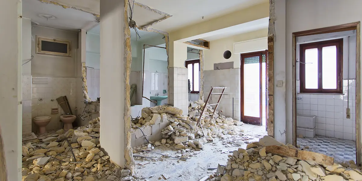 Interior of a home after demolition, pile of rubble and debris
