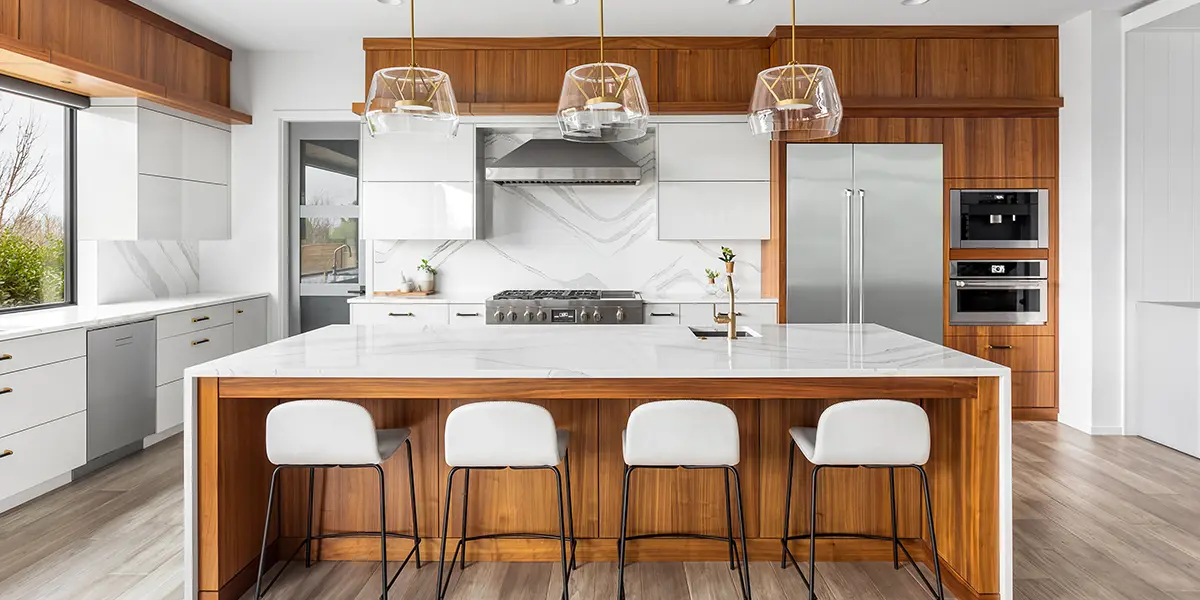 Wood and marble kitchen in organic style in earth tones