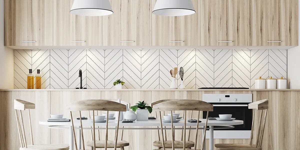 Modern backsplash pattern of white tile with black grout lines