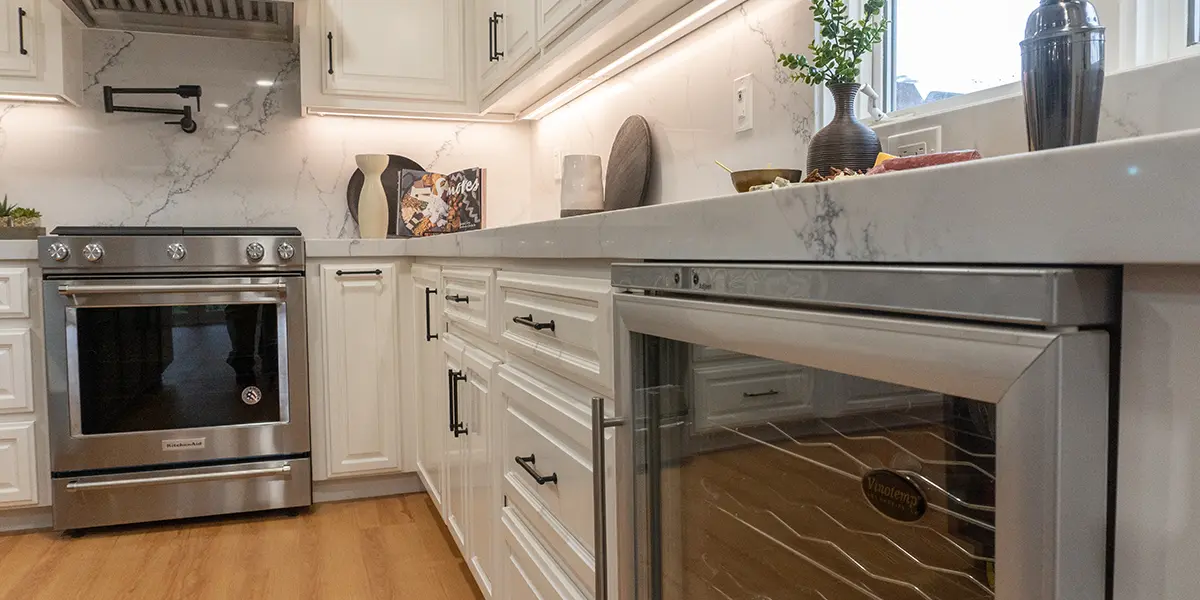 New kitchen beverage refrigerator and new oven in a renovated kitchen in California