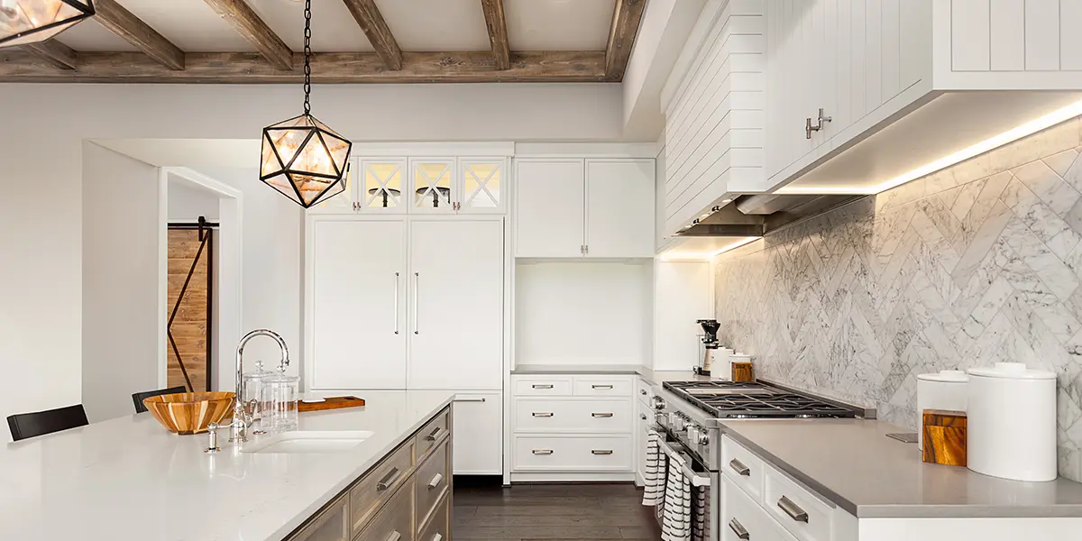 Under-cabinet lighting for a white and woody kitchen remodel in California