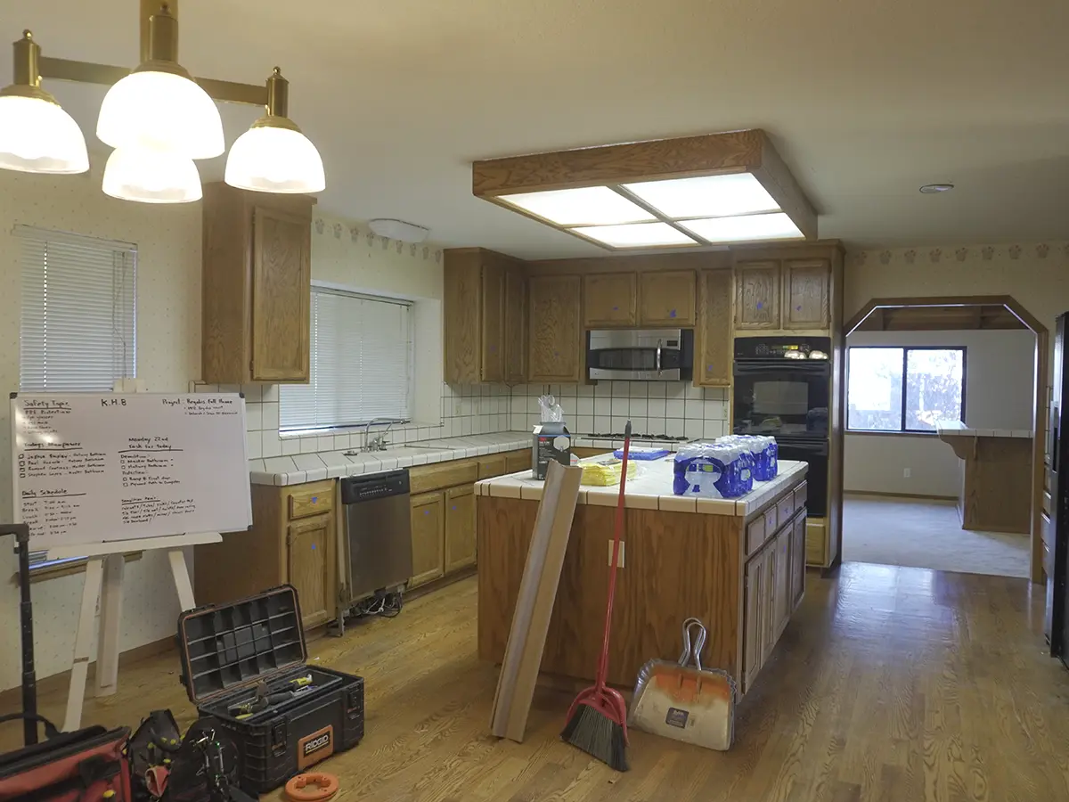 A kitchen with wood cabinets before its remodel