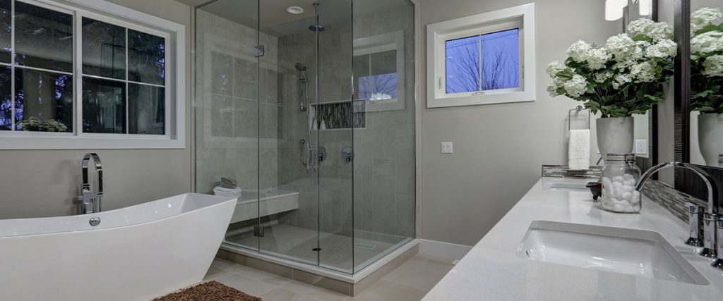 bathroom with shower and bath