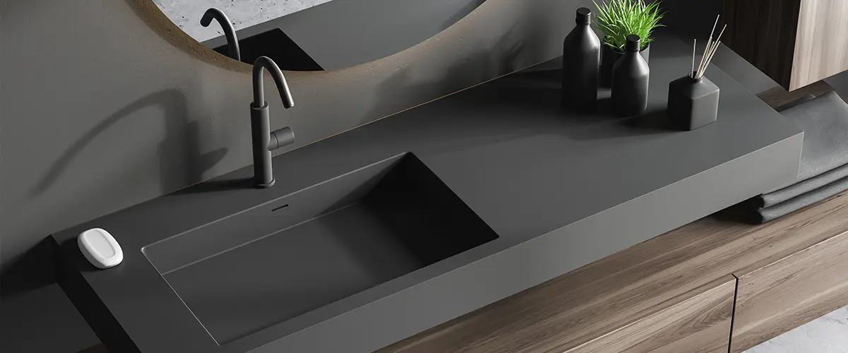 A black countertop for a modern vanity