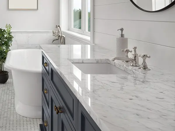 An undermount sink on a marble countertop
