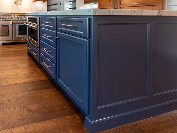 Blue kitchen cabinets on a kitchen island