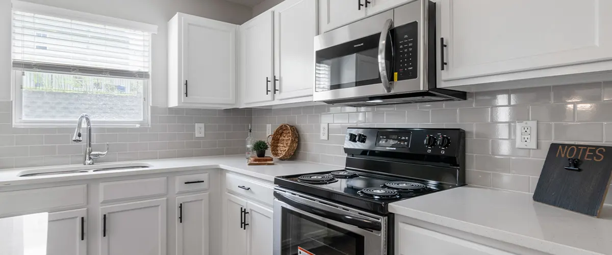 white tile kitchen backsplash