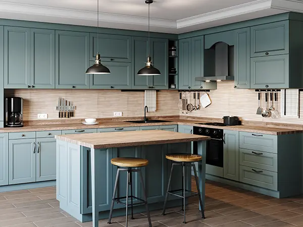 Blue cabinets in a kitchen with wood floors