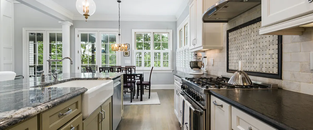 open space kitchen with stone backsplash