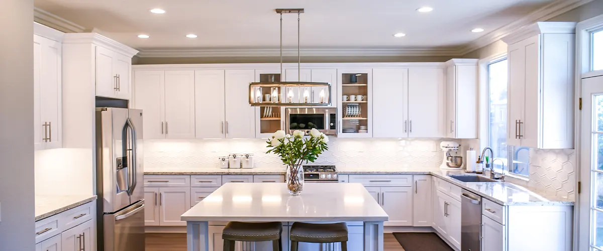 white large kitchen with island