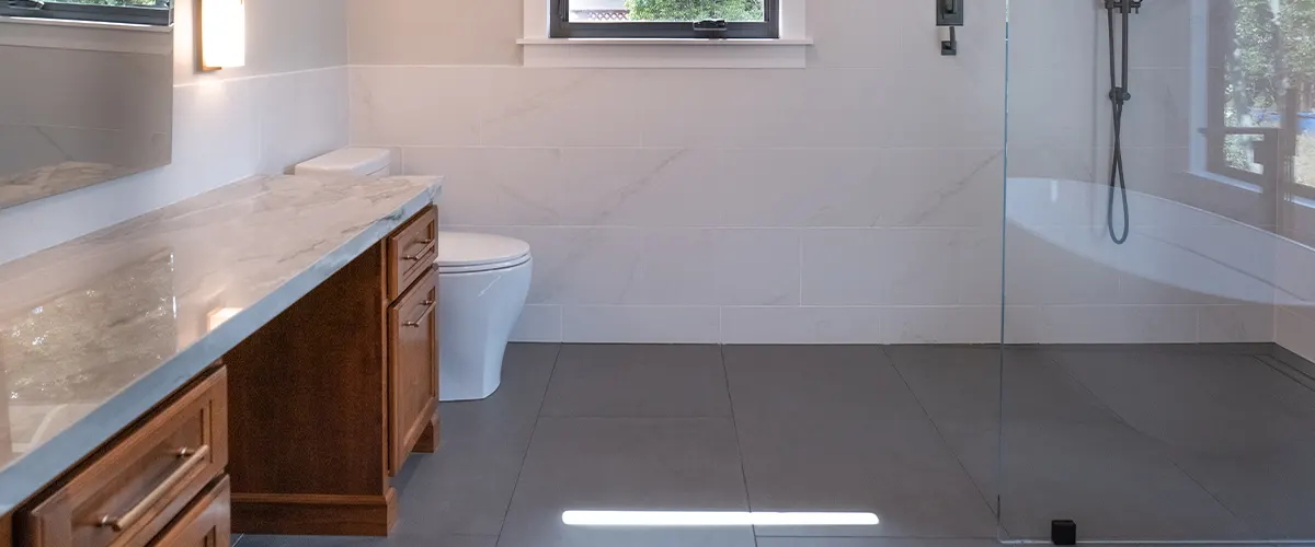 bathroom flooring with black tile