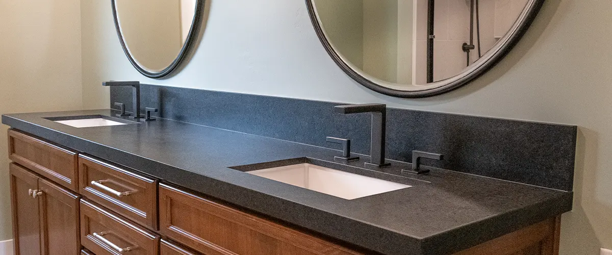 black countertops on vanity in bathroom