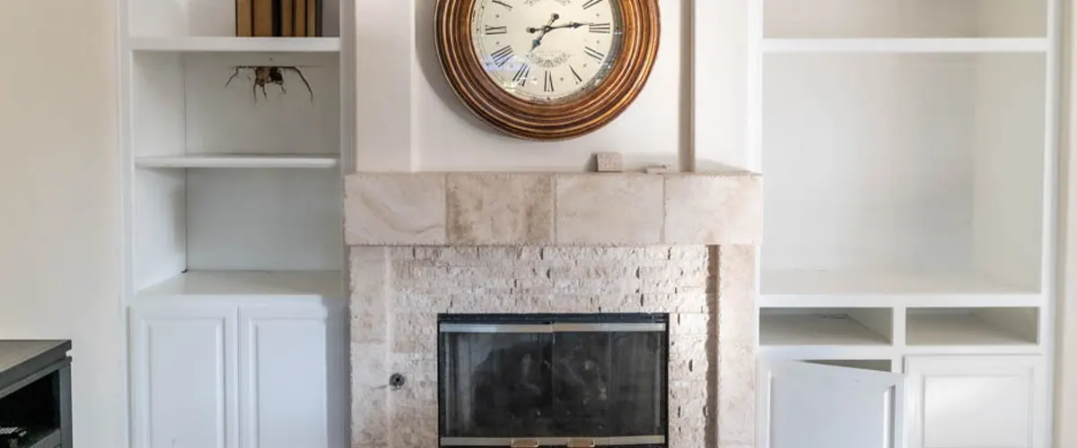 garage conversion into living space with fireplace