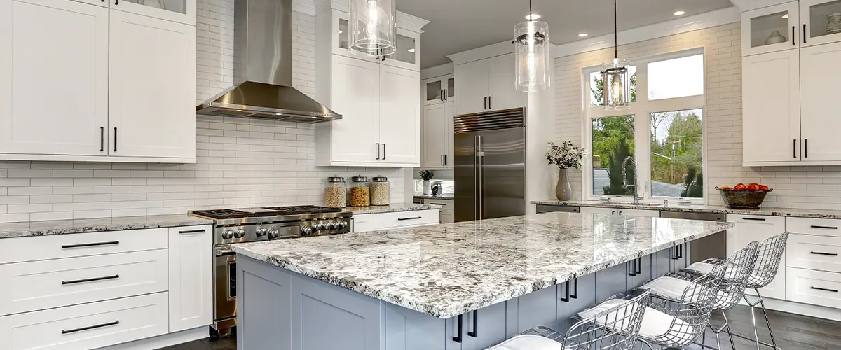 kitchen with island and white cabinets