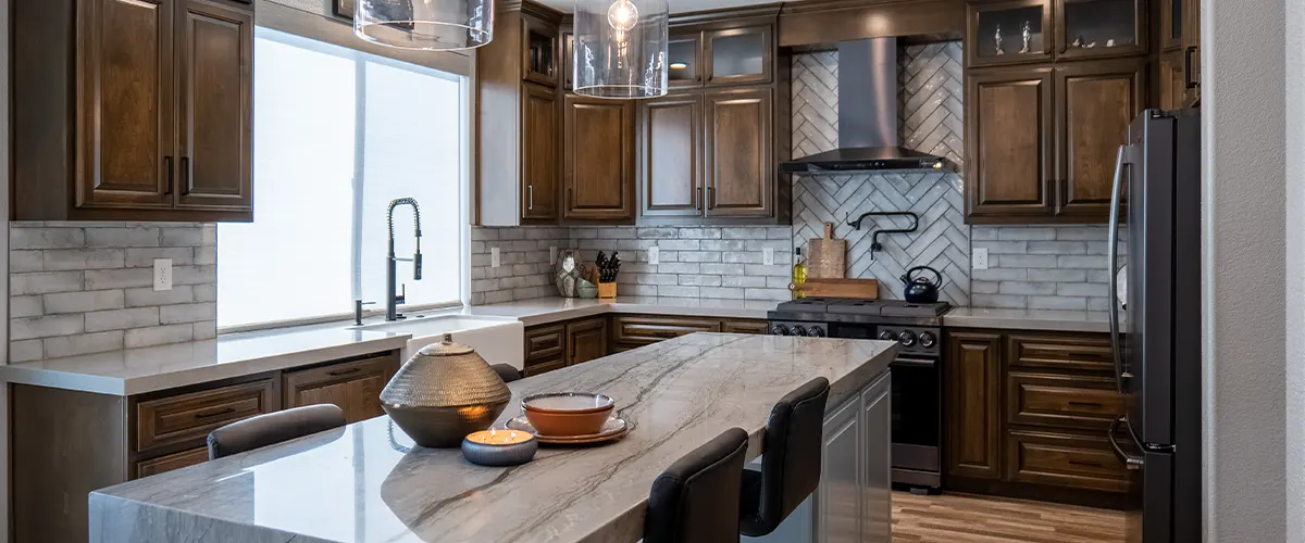 tile backsplash in kitchen with island