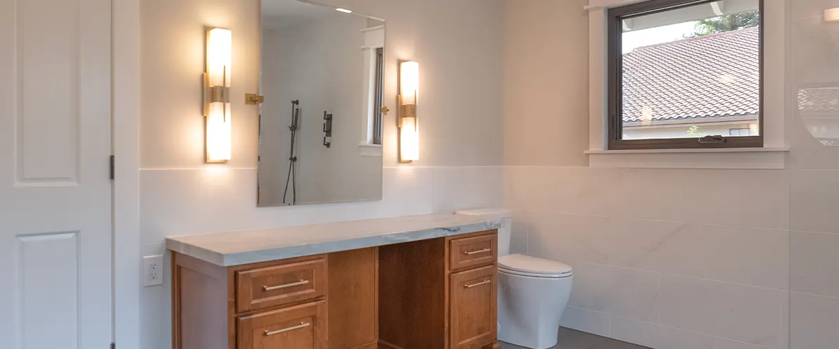 bathroom vanity with mirror and lights
