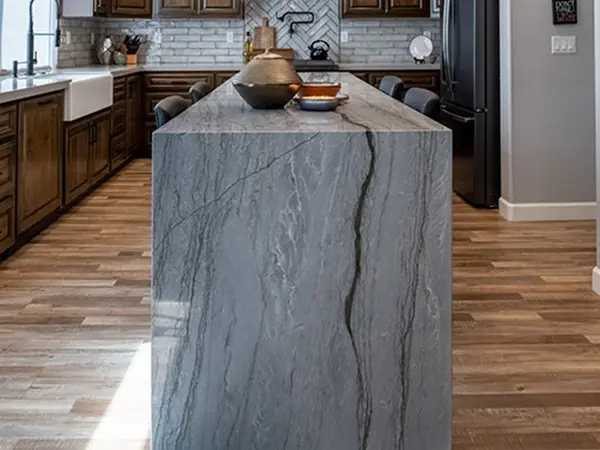 Custom waterfall countertop stone kitchen