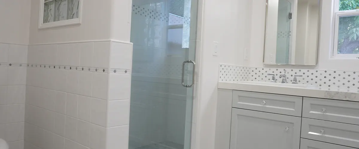 shower with glass door in bathroom