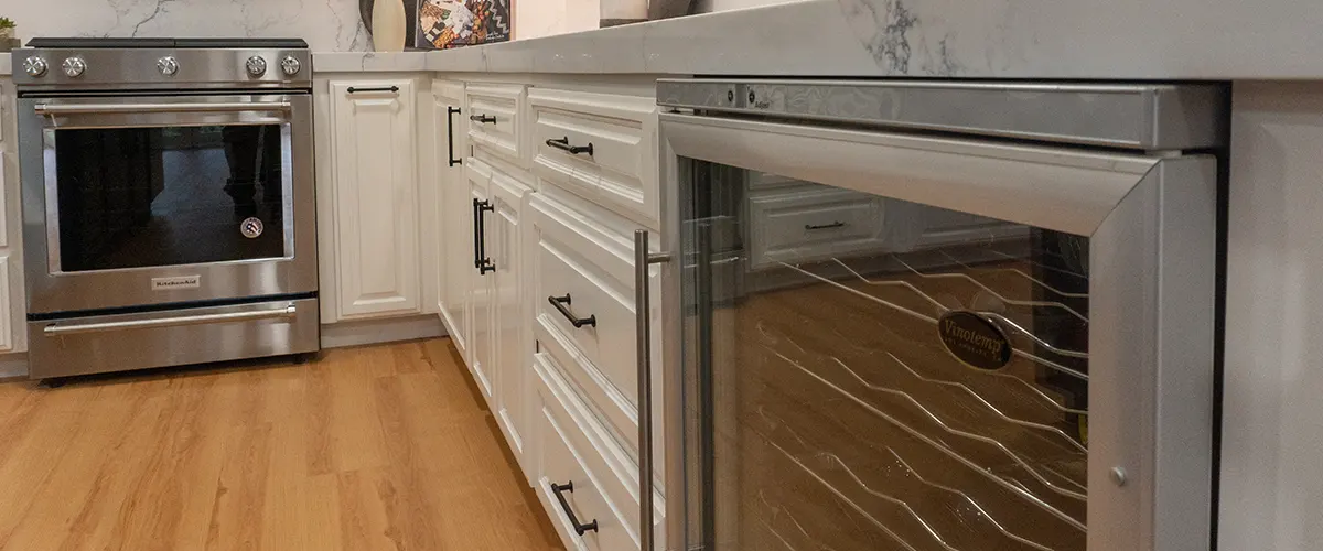 white kitchen with wooden floors