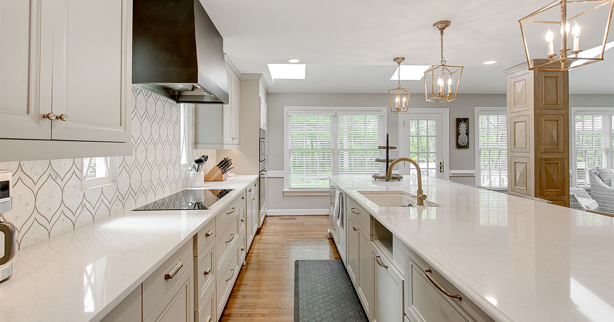 Kitchen remodeling with white cabinets and quarts countertops