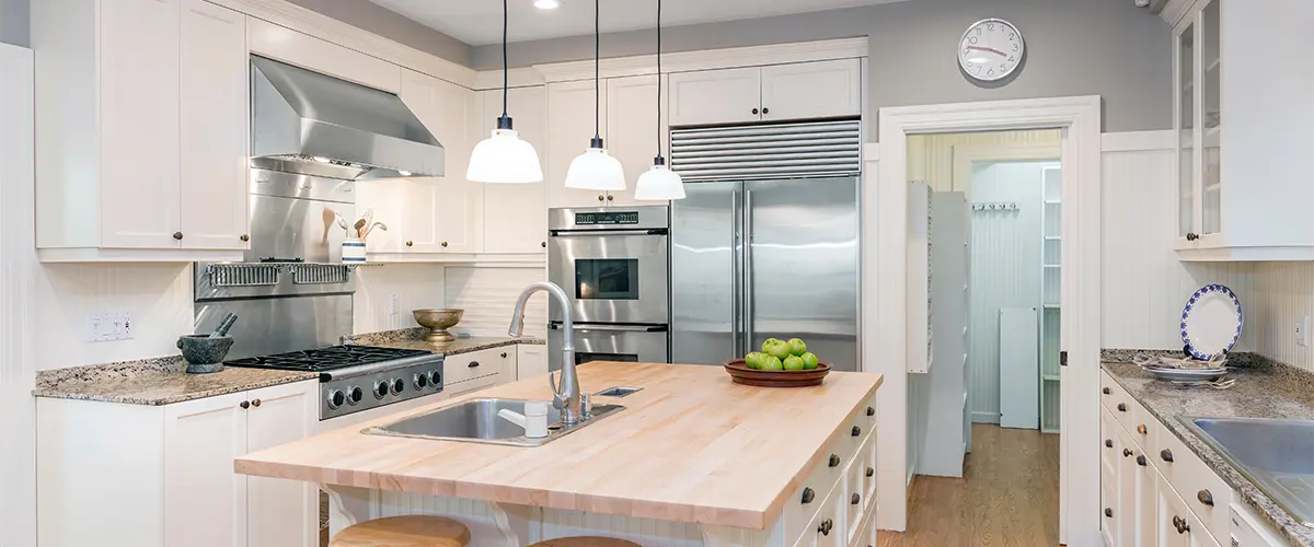 how to save money on a kitchen remodel - new white kitchen