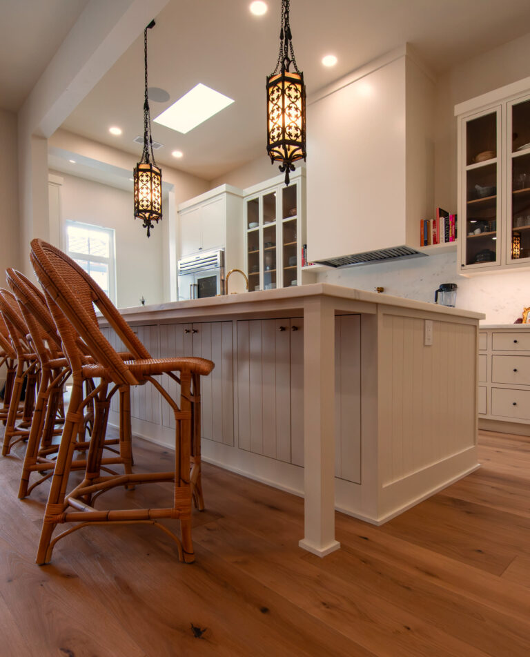 Rattan counter seating at the marble island