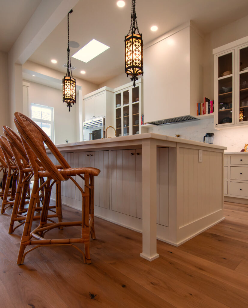 Rattan counter seating at the marble island