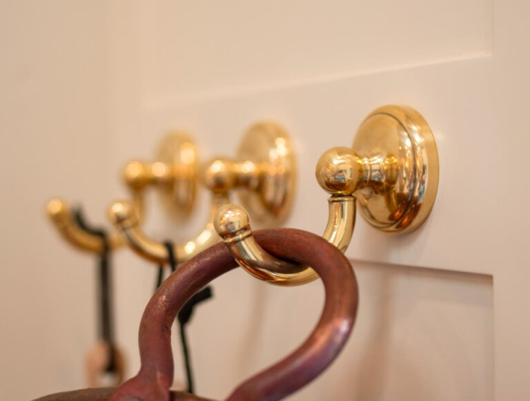 Unlacquered brass hooks, left to wear with time