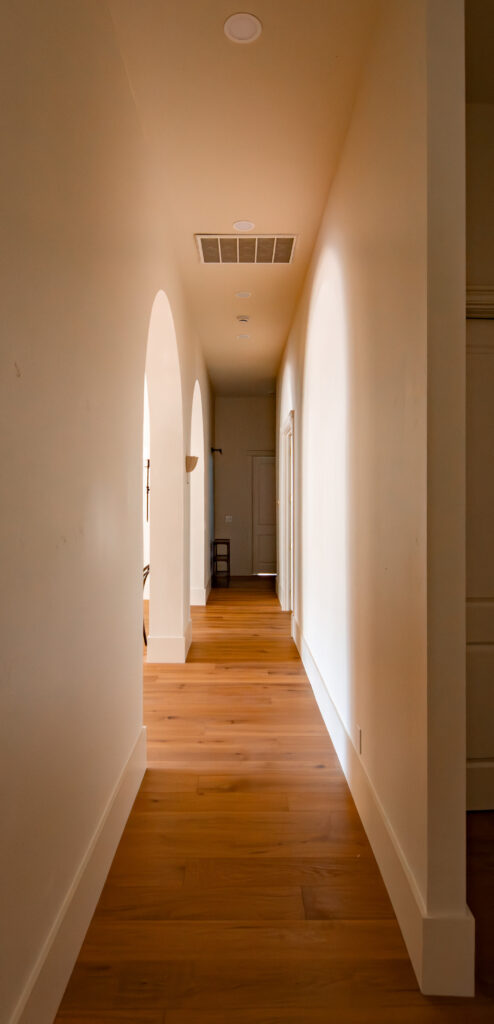 White oak floors connecting the remodeled living areas